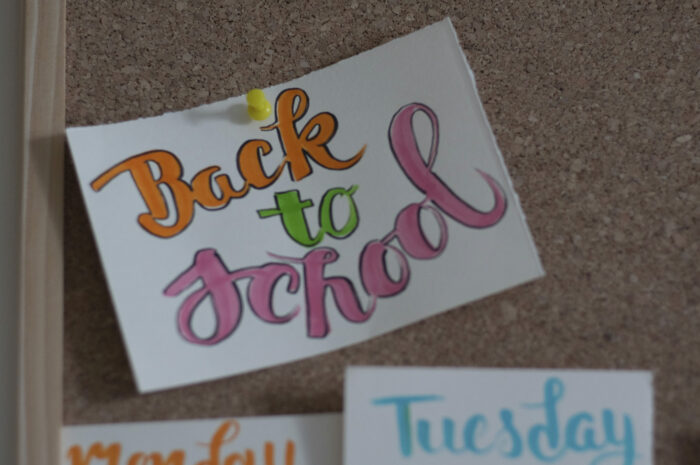 colourful back to school sign on paper