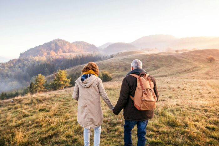 elderly married couple on a walk
